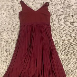 Tea length pleated dress